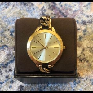 Gold Tone Michael Kors watch -Women’s
